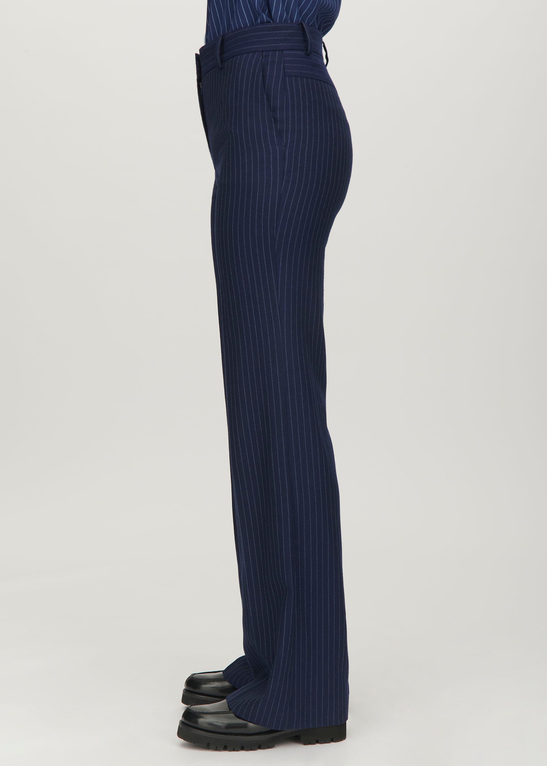 http://us.bellafreud.com/cdn/shop/products/bella-freud-pinstripe-slim-kim-trousers-navy-model-2.jpg?v=1659009071