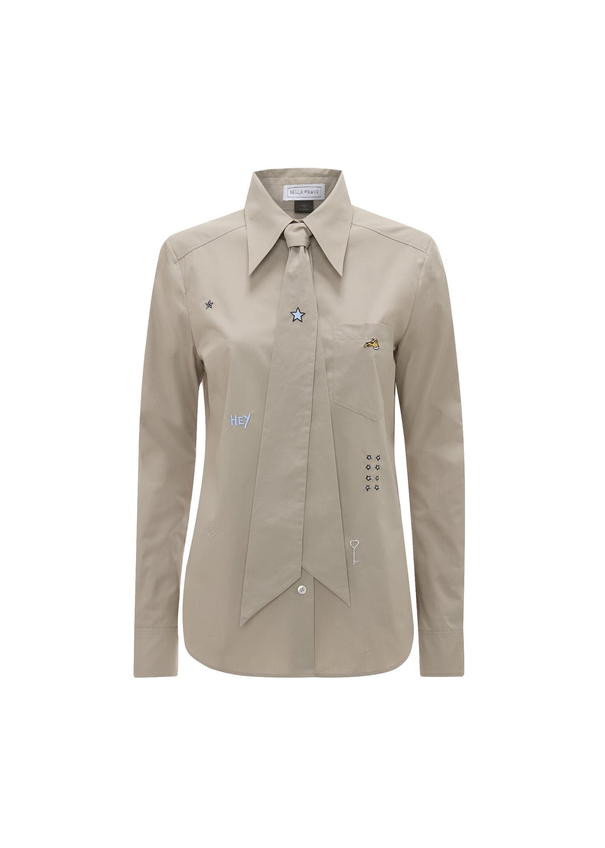 Beige shirt with embroidered details on a white background