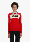 Person wearing a red sweater with '1970' print on a white background